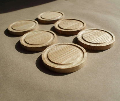 Carleau. Lot de 6 sous - verres en bois de frêne ou en bois de noyer - Que du Bois Atelier